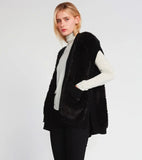 Teddy bear vest with sweater knit trim available in ivory or black