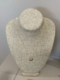 Diamond letter set in 14k matte gold disk necklace