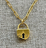 14K yellow gold paperclip necklace with lock charm