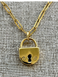 14K yellow gold paperclip necklace with lock charm