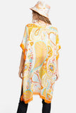 Open shawl with sleeves *matching bucket hat sold separately