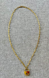 14K yellow gold paperclip necklace with lock charm