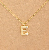 Bubble letter pendant necklace