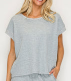 Cozy waffle knit short sleeve top available in navy and h. Grey