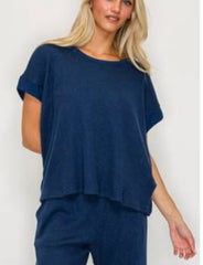 Cozy waffle knit short sleeve top available in navy and h. Grey