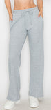 Cozy waffle knit wide leg drawstring pants available in navy and h. Grey