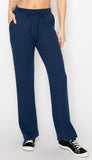 Cozy waffle knit wide leg drawstring pants available in navy and h. Grey