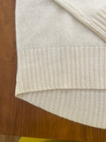 Cashmere crew neck with curved hem and chunky rib details *available in cream, black, and h. grey