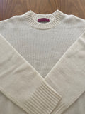 Cashmere crew neck with curved hem and chunky rib details *available in cream, black, and h. grey