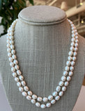 Sea Pearl necklace hand knitted with Pale pink silk 14K yellow gold clasp
