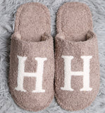 Cozy Check slippers available in taupe and black