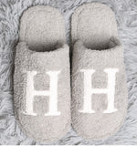 Cozy Check slippers available in taupe and black