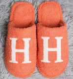 Cozy Check slippers available in taupe and black